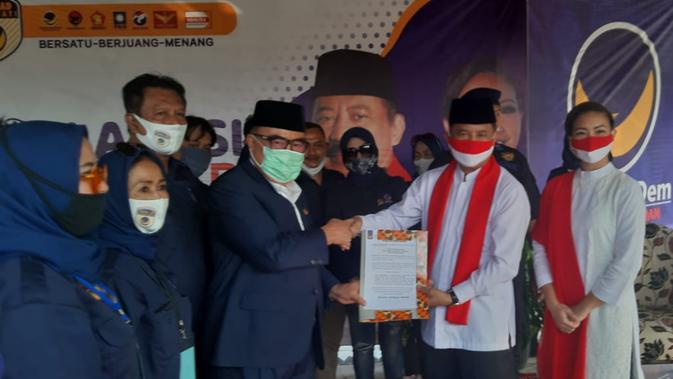 Partai Nasdem mendeklarasikan dukungan kepada pasangan bakal calon Wali Kota dan Wakil Wali Kota Tangerang Selatan (Tangsel), Muhamad-Rahayu Saraswati Djojohadikoesoemo di Lubana Sengkol, Tangerang Selatan, Selasa (1/9/2020). (Ist)