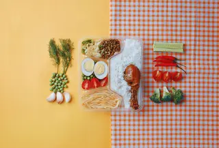 Ilustrasi kotak bekal makanan. (dok. qi bin/Unsplash)