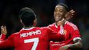 Pemain Manchester United, Anthony Martial, mencetak gol ketiga ke gawang Ipswich Town dalam laga putaran ketiga Piala Liga Inggris di Stadion Old Trafford, Manchester, Inggris, Kamis (24/9/2015) dini hari WIB. (Reuters/Andrew Yates)