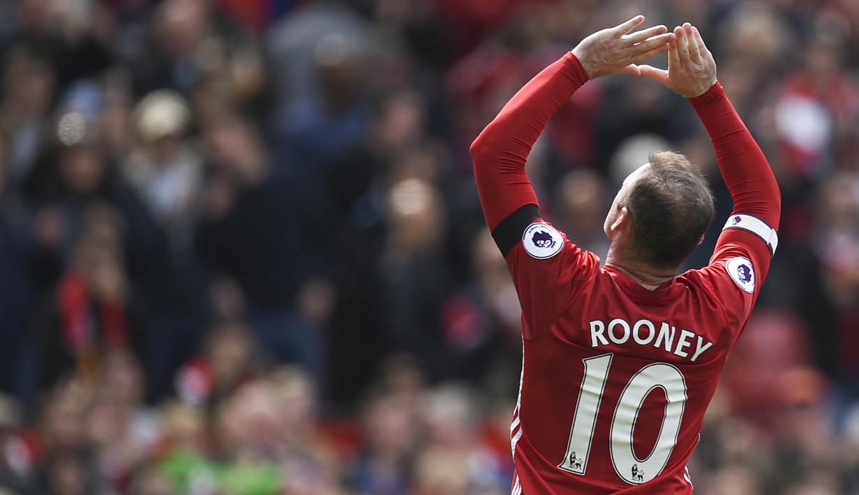 Selama 13 tahun bersama MU, Wayne Rooney berhasil mendulang 253 gol dalam 559 pertandingan. (AFP/Oli Scarff)