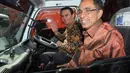 Penyerahan 14 truk sampah merk Isuzu Elf Model CC trucks itu berlangsung di Balai Kota DKI Jakarta, (18/9/14). (Liputan6.com/Herman Zakharia)