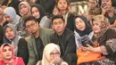 Daffa hanya mengumbar senyum ketika awak media yang menanyakan kedekatannya dengan pemeran Keira dalam film Ayat Ayat Cinta 2 itu. Ia tetap mengumbar senyum menuju lift. (Adrian Putra/Bintang.com)