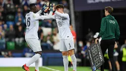 Kiper asal Spanyol itu baru masuk bermain di menit ke-119 menggantikan Edouard Mendy yang sebenarnya bermain baik. (Foto: AFP/Paul Ellis)