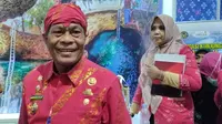 Bupati Donggala, Kasman Lassa  saat mengikuti Apkasi Otonomi Expo 2022 di Jakarta Convention Center (JCC), Senayan, Rabu (20/7/2022). (Foto: Winda Nelfira/Liputan6.com).