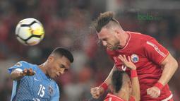 Sundulan maut Marko Simic ke gawang Johor Darul Ta’zim pada laga Piala AFC 2018 di Stadion Utama Gelora Bung Karno, Jakarta, Selasa (10/4/2018). Persija Jakarta menang 4-0.  (Bola.com/Nick Hanoatubun)