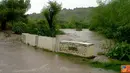 Citizen6, Kilo: Banjir di jalan Kore-Kiwu, Kecamatan Kilo, Kabupaten Dompu, Nusa Tenggara, telah meluap sampai kebadan ruas jalan. (Pengirim: Aji)