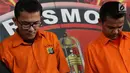 Tersangka pencurian dan pembunuhan sadis terhadap Jeanne Setyadi (78) tertunduk di Polda Metro Jaya, Jakarta, Kamis (26/7). Kasus ini terungkap setelah polisi menangkap MIF yang menjadi eksekutor. (Liputan6.com/Immanuel Antonius)