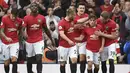 Gelandang Manchester United, Daniel James (kedua kanan) berselebrasi dengan rekannya usai mencetak gol ke gawang Chelsea pada pertandingan Liga Inggris di Old Trafford (11/8/2019). MU menang telak 4-0 atas Chelsea. (AFP Photo/Oli Scarff)