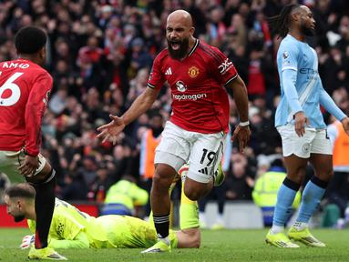 Manchester United berhasil memenangkan laga saat menjamu Manchester City dalam pertandingan lanjutan Liga Inggris 2025/2026 di Old Trafford, Manchester, Inggris, Sabtu (17/01/2026) waktu setempat. (AFP/Darren Staples)