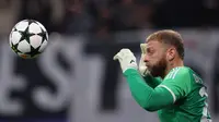 Kiper Juventus, Michele Di Gregorio, saat tampil menghadapi RB Leipzig dalam laga matchday kedua Liga Champions 2024/2025, Kamis (3/10/2024) dini hari WIB. Juventus menang 3-2 atas RB Leipzig dalam pertandingan ini. (Ronny HARTMANN / AFP)
