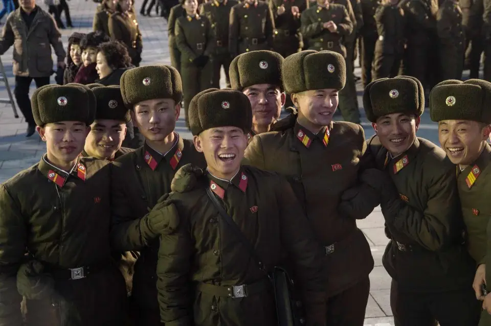 Korea Utara menggelar perayaan atas kesuksesan tes rudal termutakhir yang dilesatkan pada 29 November lalu. Perayaan itu dilaksanakan di Pyongyang pada 30 November 2017 (Kim Won-jin/AFP)