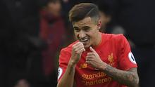 Gelandang Liverpool, Philippe Coutinho, merayakan gol yang dicetaknya ke gawang Watford pada laga Premier League di Anfield Stadium, Inggris, Minggu (6/11/2016). (AFP/Paul Ellis)