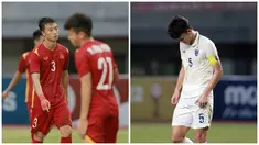Kolase foto dari ekspresi pemain Vietnam U-19, Trinh Hoang Canh (kiri) dan pemain Thailand U-19, Chanapach Buaphan (kanan) usai dikalahkan masing-masing tim di semifinal Piala AFF U-19. Kekalahan Vietnam dan Thailand di semifinal ini bak karma yang harus mereka terima usai membuat Timnas Indonesia U-19 tersingkir di Piala AFF U-19 2022.