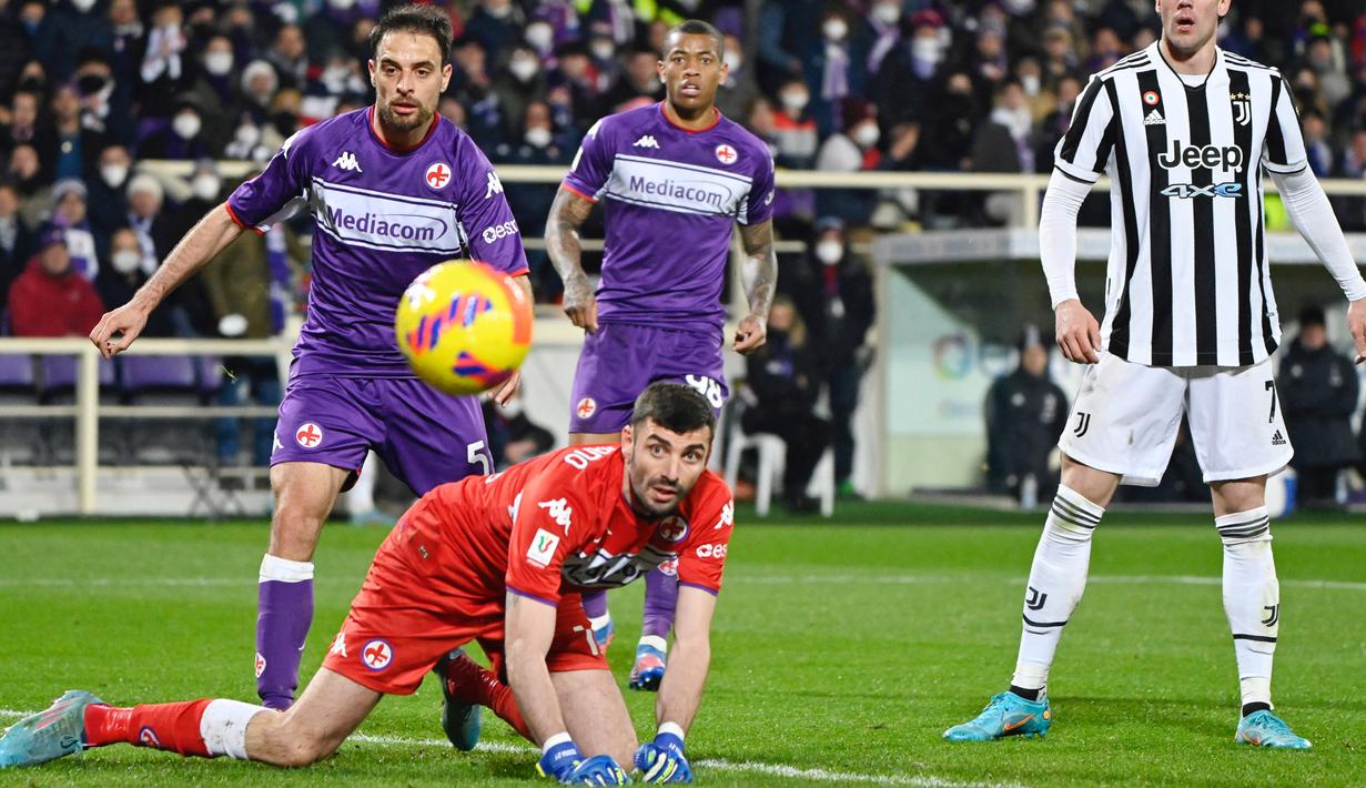 Kemenangan Juventus hadir berkat gol bunuh diri pemain Fiorentina Lorenzo Venuti pada masa injury time babak kedua. (AFP/Alberto Pizzoli)