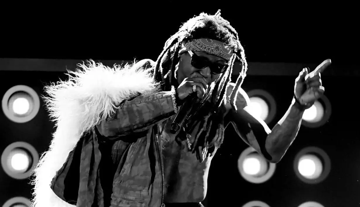 Lil Wayne miliki 4 anak dari 4 wanita yang berbeda. Wanita tersebut ialah Anyonia"Toya" Carter, Sarah Vivan, Lauren London dan Nivea B. Hamilton. (Ethan Miller / GETTY IMAGES NORTH AMERICA / AFP)