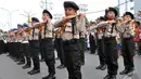Sejumlah polisi cilik yang berseragam polisi lengkap, memperlihatkan kekompakan baris-berbaris di acara tahunan Karnaval Budaya Lubuklinggau pada perayaan HUT yang ke-13, (17/10/14). (Liputan6.com/Miftahul Hayat)