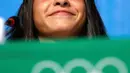 Yusra Mardini tersenyum saat latihan jelang Olimpiade 2016 di Rio De Janeiro, Brasil (1/8). Yusra Mardini melarikan diri dari Suriah akibat perang pada 2015. (REUTERS/Michael Dalder)