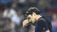 Roger Federer, secara mengejutkan langsung tersingkir dari ajang Shanghai Masters setelah kalah dari petenis Spanyol, Albert Ramos-Vinolas.
