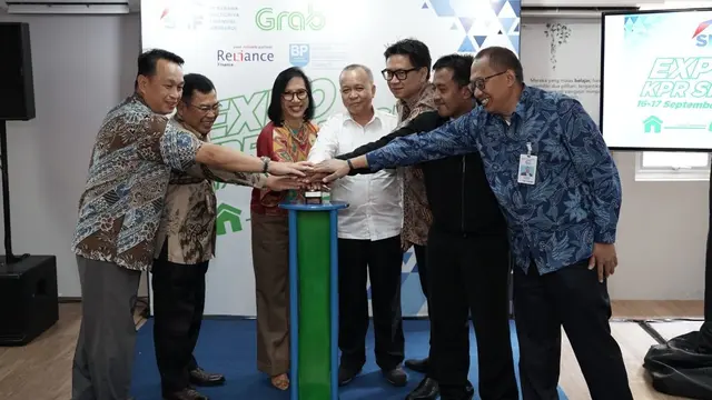 SMF dan Grab Indonesia mengumumkan kerja sama strategis untuk memberikan akses KPR bagi para mitra pengemudi GrabCar melalui Program KPR SMF-Grab.