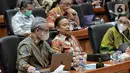 Menteri Kesehatan Budi Gunadi Sadikin (tengah) mengikuti rapat kerja dengan Komisi IX DPR di Kompleks Parlemen Senayan, Jakarta, Rabu (30/11/2022). Dalam raker tersebut membahas mengenai peningkatan capaian bulan Imunisasi Anak Sekolah (BIAS) dan Bulan Imunisasi Nasional (BIAN), program penguatan pelayanan kesehatan rujukan, serta penguatan pelayanan kesehatan primer melalui pemindaian dan revitalisasi fungsi puskesmas. (Liputan6.com/Angga Yuniar)