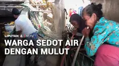 Warga Sedot Air dengan Mulut