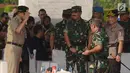 Kapolri Jenderal Tito Karnavian dan Panglima TNI Marsekal Hadi Tjahjanto menghadiri apel bersama di Silang Monas, Jakarta, Kamis (13/6/2019). Apel dalam rangka konsolidasi Ketupat Jaya 2019 dan Kesiapan Pengamanan Sidang Perselisihan Hasil Pemilihan Umum (PHPU) di MK. (merdeka.com/Imam Buhori)