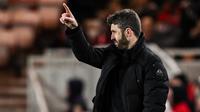 Manajer Middlesbrough asal Inggris, Michael Carrick, bereaksi selama pertandingan sepak bola leg pertama semifinal Piala Liga Inggris antara Middlesbrough dan Chelsea di Stadion Riverside di Middlesbrough, timur laut Inggris pada 9 Januari 2024. (Oli SCARFF/AFP)