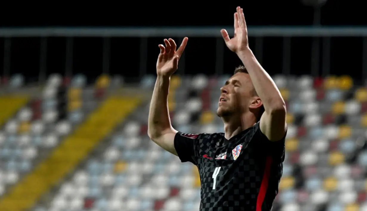 Pemain Kroasia Ivan Perisic melakukan selebrasi usai mencetak gol ke gawang Malta pada pertandingan Grup H kualifikasi Piala Dunia 2022 di Stadion Rujevica, Rijeka, Kroasia, Selasa (30/3/2021). (Denis LOVROVIC/AFP)