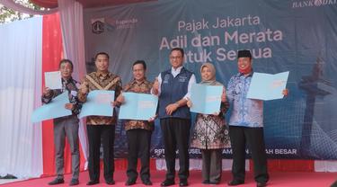 Gubernur DKI Jakarta Anies Baswedan menghadiri acara Pajak Jakarta Adil dan Merata. (Liputan6.com/Winda Nelfira)