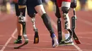 Para atlet tengah bersiap melakukan sprint menggunakan Prosthetics pada ajang Invictus Games Orlando 2016 di ESPN Wide World of Sports complex, (10/5/2016), Lake Buena Vista, Florida. (Alex Menendez/ Getty Images for Invictus Games/AFP)