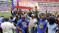 Para pemain dan staf pelatih DR Kongo merayakan kemenangan setelah lolos ke Piala Dunia selama pertandingan play-off final kualifikasi Piala Dunia 2026 antara Republik Demokratik Kongo dan Jamaika di Stadion Akron di Zapopan, negara bagian Jalisco, Meksiko, pada 31 Maret 2026. (Ulises Ruiz/AFP)