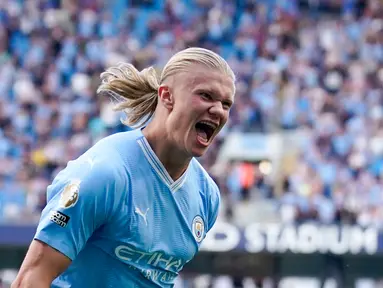 Pemain Manchester City Erling Haaland melakukan selebrasi usai mencetak gol ke gawang Fulham pada pertandingan sepak bola Liga Inggris di Etihad Stadium, Manchester, Inggris, Sabtu (2/9/2023). Manchester City menang 5-1. (AP Photo/Dave Thompson)