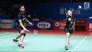 Pebulu tangkis ganda campuran Indonesia, Tontowi Ahmad/Winny Oktavina Kandow saat melawan Satwiksairaj Rankireddy/Ashwini Ponnappa (India) di di Babak 32 besar Indonesia Open 2019 di Istora Senayan, Jakarta, Rabu (17/7/2019). Tontowi/Winny unggul 21-13, 21-11. (Liputan6.com/Helmi Fitrhiansyah)