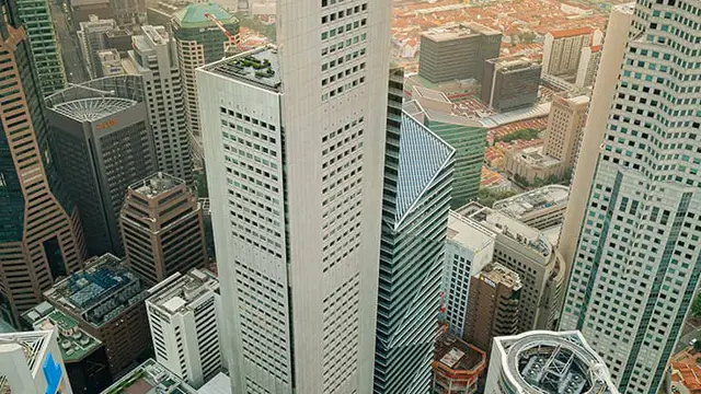 Taipan Mochtar Riady dan keluarganya berencana menjual One Raffles Place, salah satu gedung pencakar langit tertinggi di kawasan pusat bisnis Singapura. Dok One Raffles Place