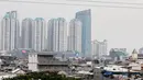 Sejumlah gedung pencakar langit berdiri tegak di Jakarta, Rabu (15/10/14). (Liputan6.com/Faizal Fanani)
