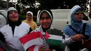 Pada aksi tersebut, massa mengecam dan mengutuk serangan tentara Israel atas agresi yang dilancarkan ke Masjid Al-Aqsa serta rumah ibadah lainnya, Jakarta, Jumat (14/11/2014). (Liputan6.com/Johan Tallo)