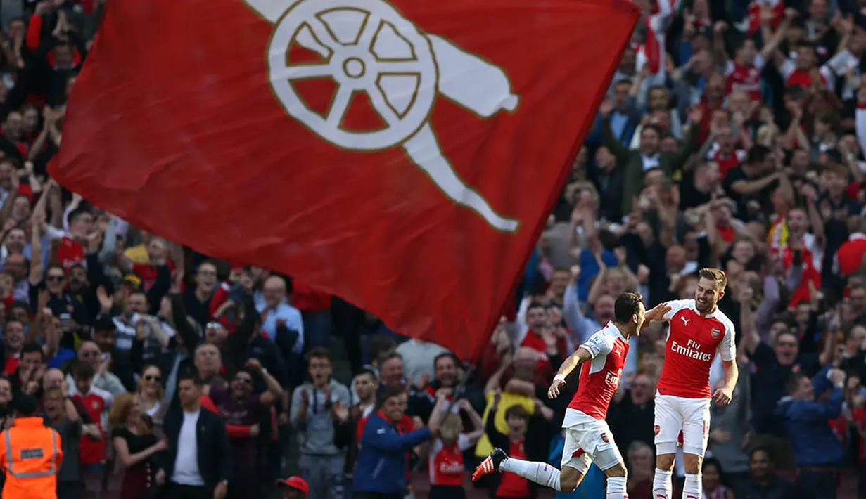 Musim 2015/2016 merupakan momentum terbaik Arsenal untuk meraih gelar juara Liga Inggris. The Gunners berhasil duduk pada peringkat kedua klasemen sementara. (AFP/Justin Tallis)