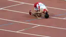 Rini Budiarti meraih emas nomor lari halang rintang 3.000m SEA Games yang berlangsung di Stadion Nasional Singapura. Jumat (12/6). (Bola.com/Arief Bagus)