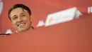 Pelatih baru AS Monaco, Niko Kovac dari Kroasia tersenyum saat konferensi pers selama presentasi resminya di Monako (21/7/2020). Niko Kovac mengawali karirnya sebagai manajer dengan menangani Timnas Kroasia U-21. (AFP Photo/Yann Coatsaliou)