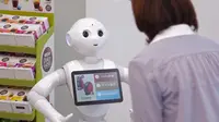 Robot bernama Pepper diposisikan di bagian depan toko untuk membantu pemasaran mesin pembuat kopi Nescafe