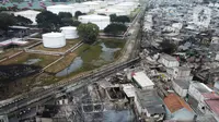 Foto udara kondisi permukiman warga yang hangus akibat kebakaran Depo Pertamina Plumpang di Jalan Koramil, Rawa Badak, Jakarta Utara, Sabtu (4/3/2023). (Liputan6.com/Herman Zakharia)