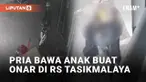 Seorang pria pemotor terekam berbuat onar di sebuah rumah sakit di Singaparna, Tasikmalaya, Jawa Barat (21/6/2023). Ia tiba-tiba menabrakkan motornya ke meja pelayanan di depan RS. Miris, pelaku melakukannya sambil membawa anak.