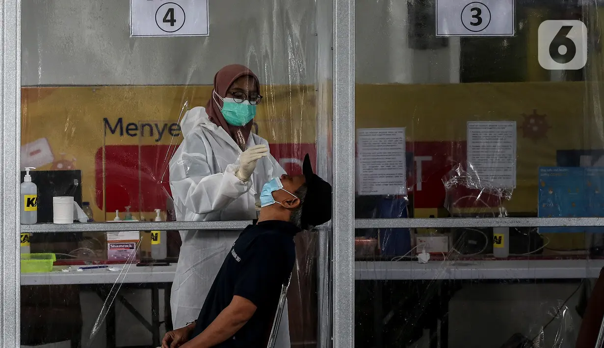 FOTO Hari Pertama Penerapan Tes GeNose C19 di Stasiun Gambir Foto