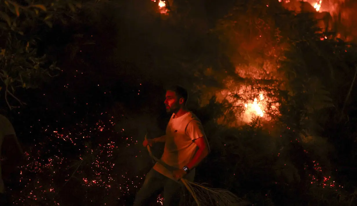 Portugal bukan satu-satunya negara yang harus menghadapi panas ekstrem musim panas ini. (PATRICIA DE MELO MOREIRA/AFP)