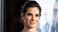 Sandra Bullock sukses menyembunyikan kelahiran anaknya, Laila. (VALERIE MACON / AFP)