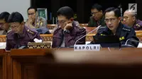 Kapolri Jenderal Pol Tito Karnavian mengikuti raker dengan Komisi III DPR di Gedung Nusantara II, Kompleks Parlemen, Senayan, Jakarta, Selasa (5/6). Rapat membahas Rencana Kerja Anggaran Kementerian/Lembaga (RKA K/L). (Liputan6.com/Johan Tallo)