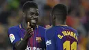 5. Samuel Umtiti (Prancis) - Sebesar 500 juta euro dengan kontrak hingga 30 Juni 2023. (Photo by LLUIS GENE / AFP)