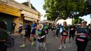 Ajang ini selalu menarik ribuan pelari dari berbagai negara. Tampak dalam foto, para pelari berpartisipasi dalam Maraton Palestina di kota Betlehem, Tepi Barat, Jumat 8 Mei 2026. (AP Photo/Mahmoud Illean)