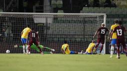 Venzuela unggul lebih dulu melalui gol yang dicetak oleh Eric Yamires pada menit ke-11. (AP/Ariana Cubillos)