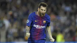 1. Lionel Messi (Barcelona) - 11 Gol. (AFP/Lluis Gene)